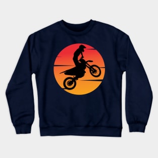 motocross silhouette jumping in front of the afternoon sun Crewneck Sweatshirt